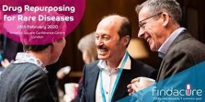 Image of 2 men and a woman talking with a pink banner layered on top saying drug repurposing for rare diseases.