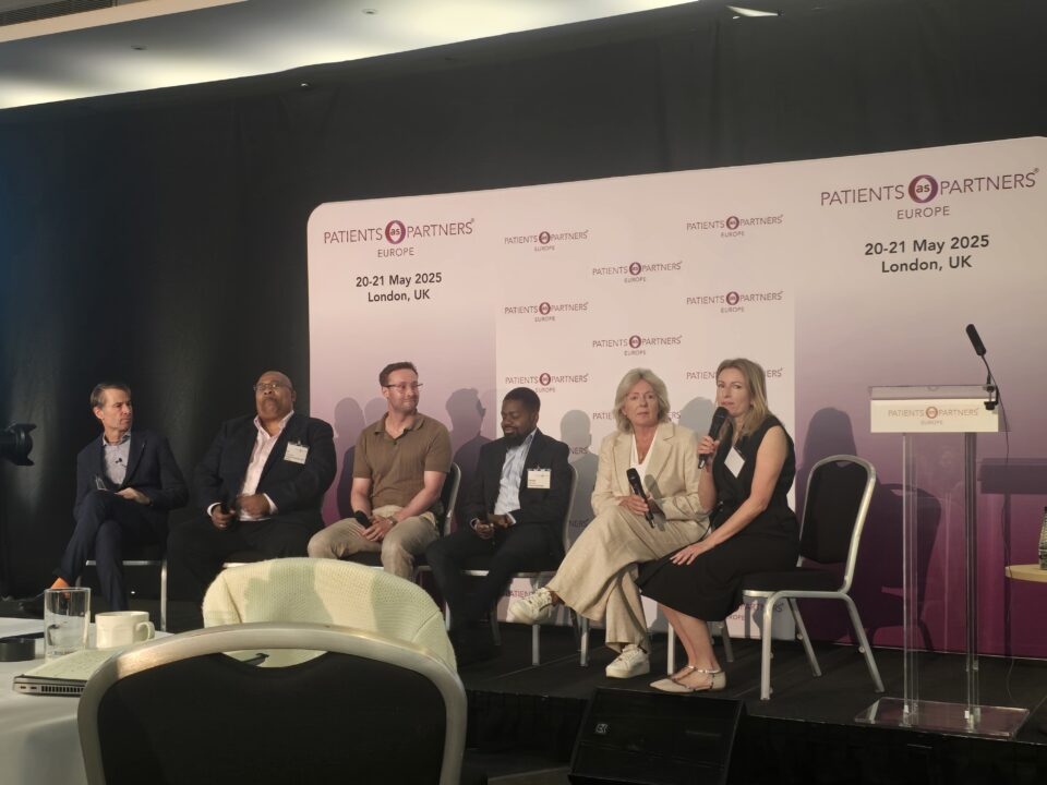 Sarah Davies speaking as part of a panel presentation at Patients as Partners EU 2025.